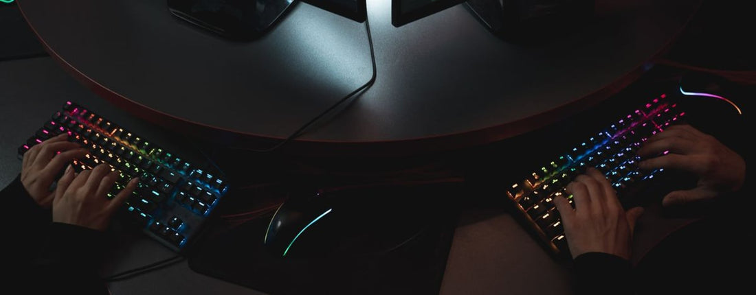 Gaming laptop running Cyberpunk 2077 in a warm room, illustrating laptop overheating symptoms