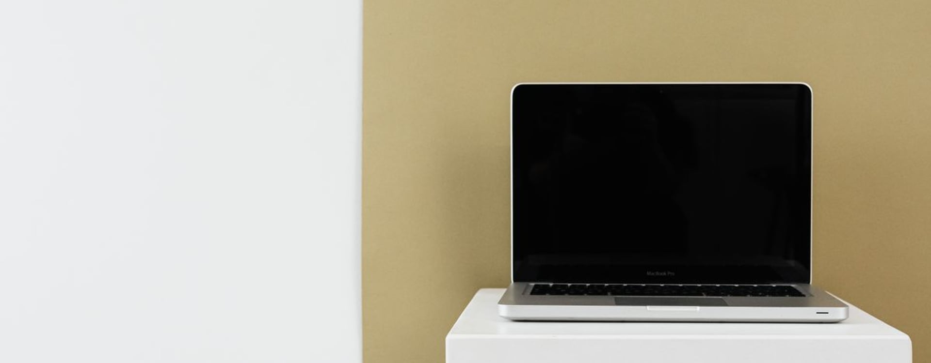 A laptop's intricate bottom vents, hinting at the hidden dust buildup that can affect a laptop cooling fan's efficiency.
