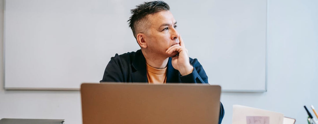 A laptop running a video conference and multiple browser tabs, illustrating common scenarios for cooling laptop challenges.