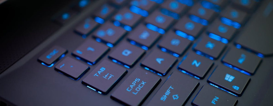 A gaming laptop displaying a vibrant game, sitting on a modern desk in a dimly lit room, highlighting the immersive experience of gaming.
