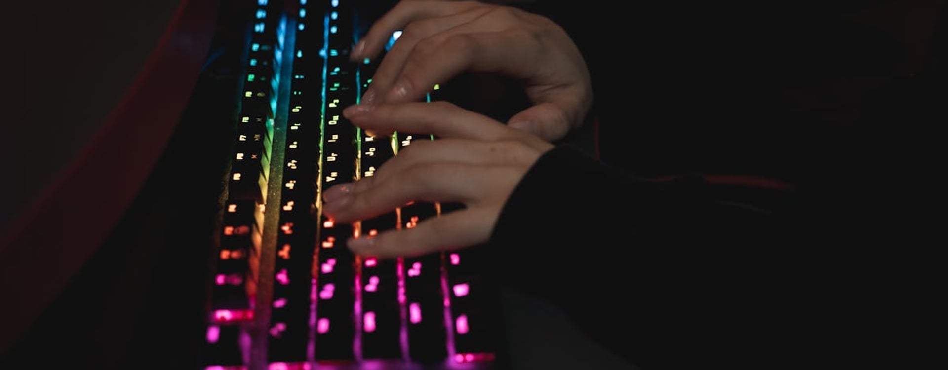 A gaming laptop on a desk, running a demanding application, highlighting the need for effective thermal management and PTM7950 install.