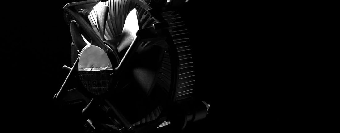 A gamer immersed in a long gaming session, highlighting the need for effective TEC cooler vs fan cooler gaming solutions.