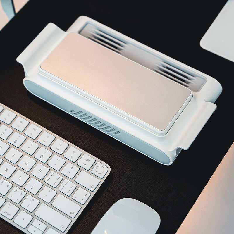 KryoZon H4 PRO laptop stand with cooling fans and storage space for accessories